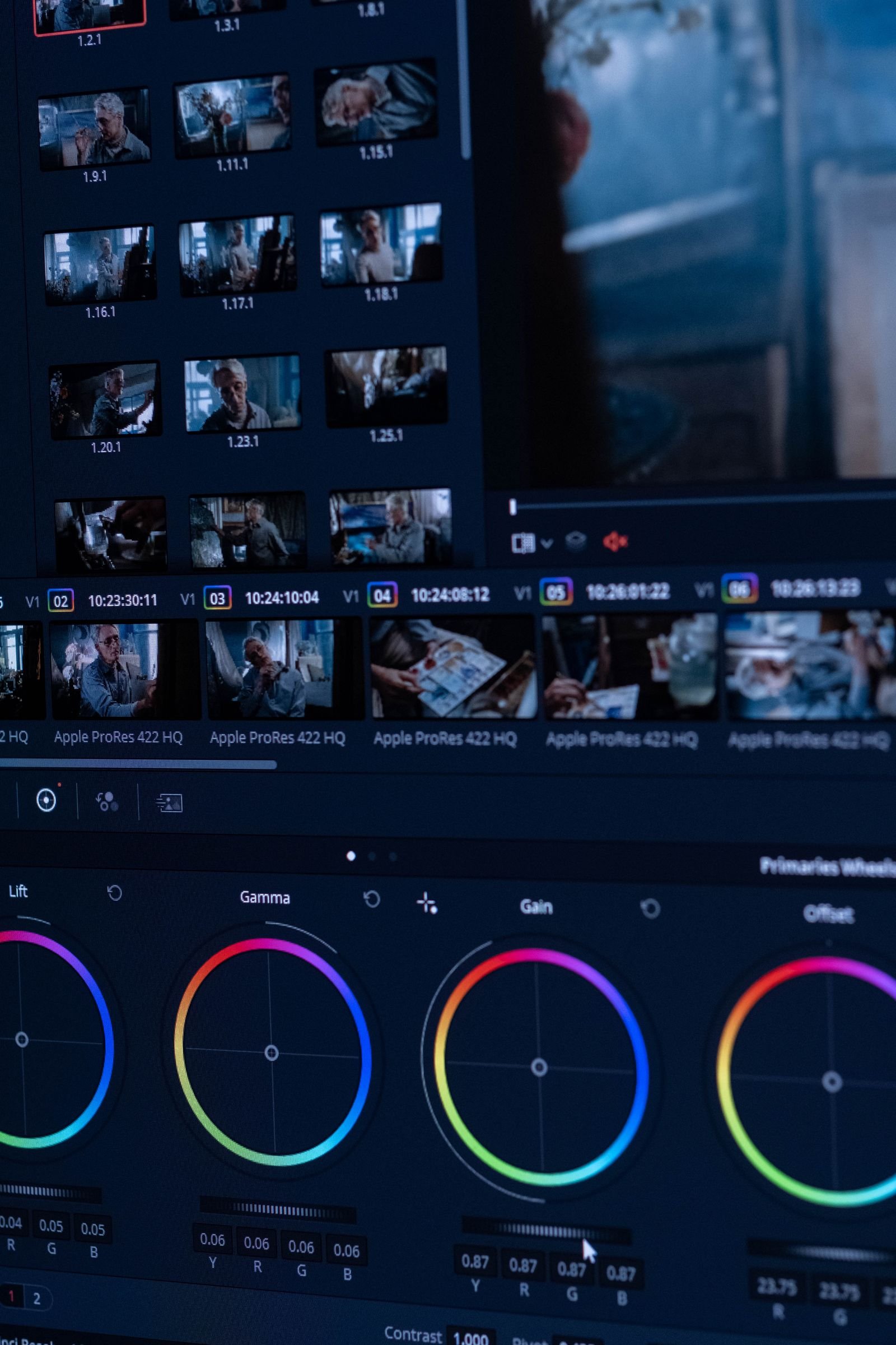 DaVinci Resolve color grading interface open on a monitor