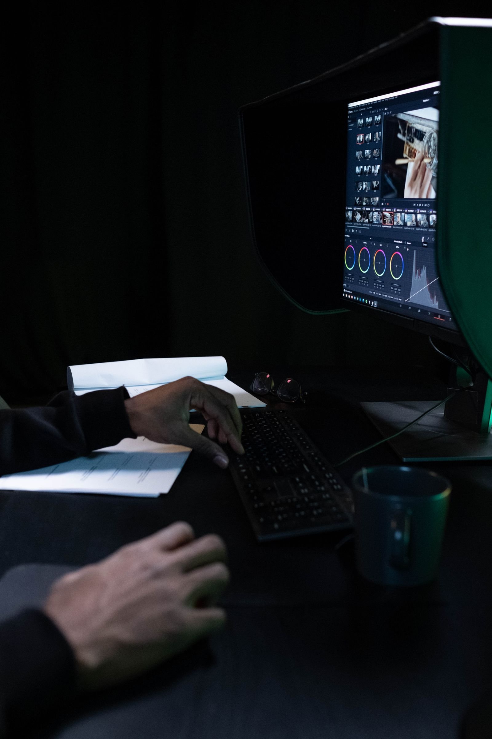 Video editor color grading footage in DaVinci Resolve Studio on a Mac