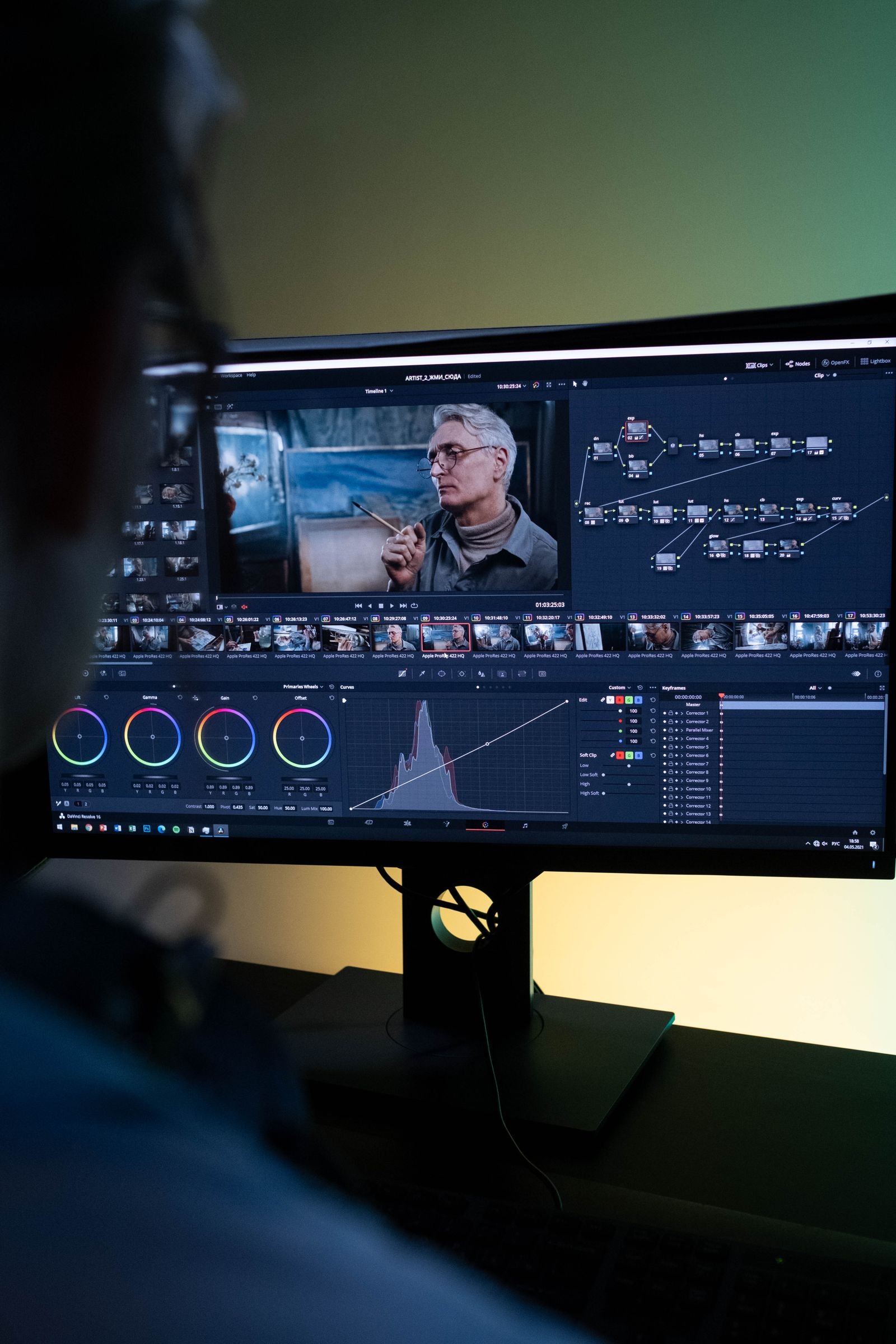 Film editing studio with footage on screen