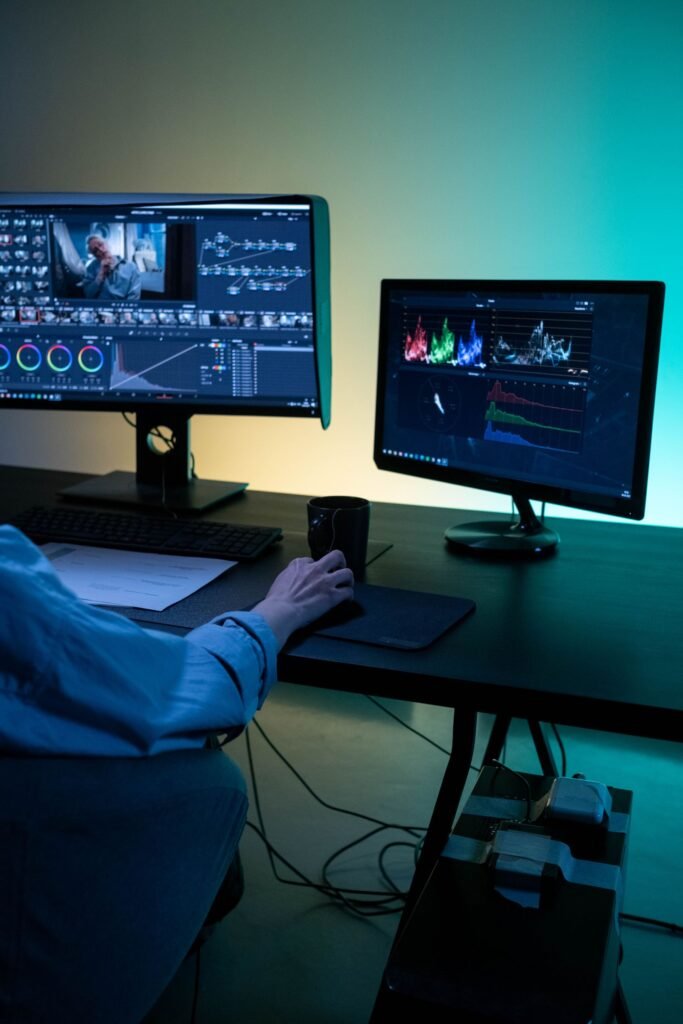 Editor color grading video on a dual monitor Mac setup