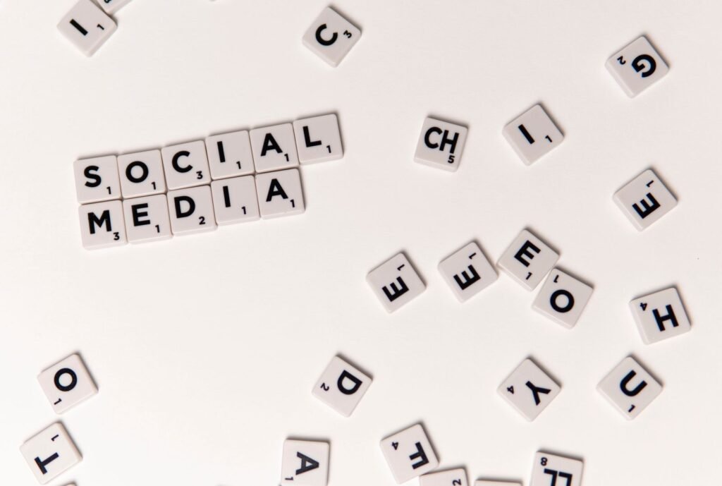 Person scheduling social media posts on a smartphone