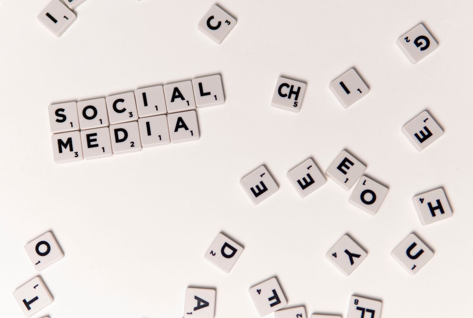 Person scheduling social media posts on a smartphone