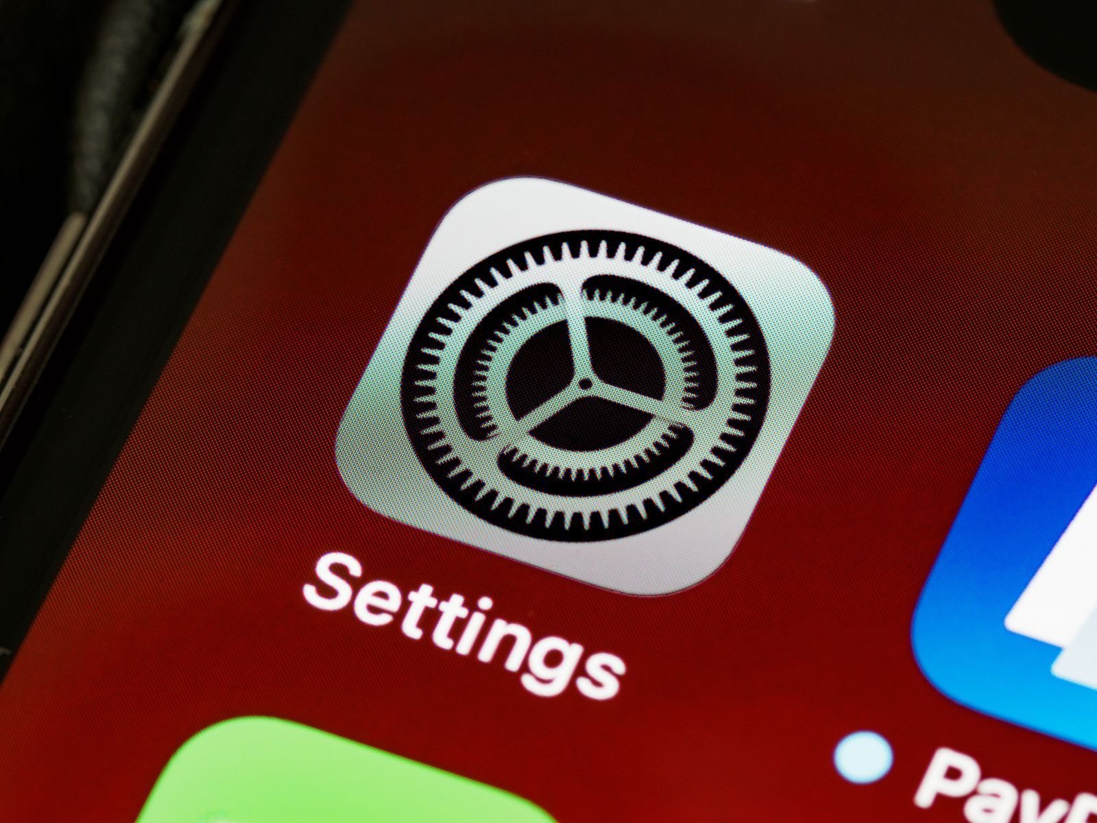 Close-up of the iPhone Settings icon where you manage Control Center options