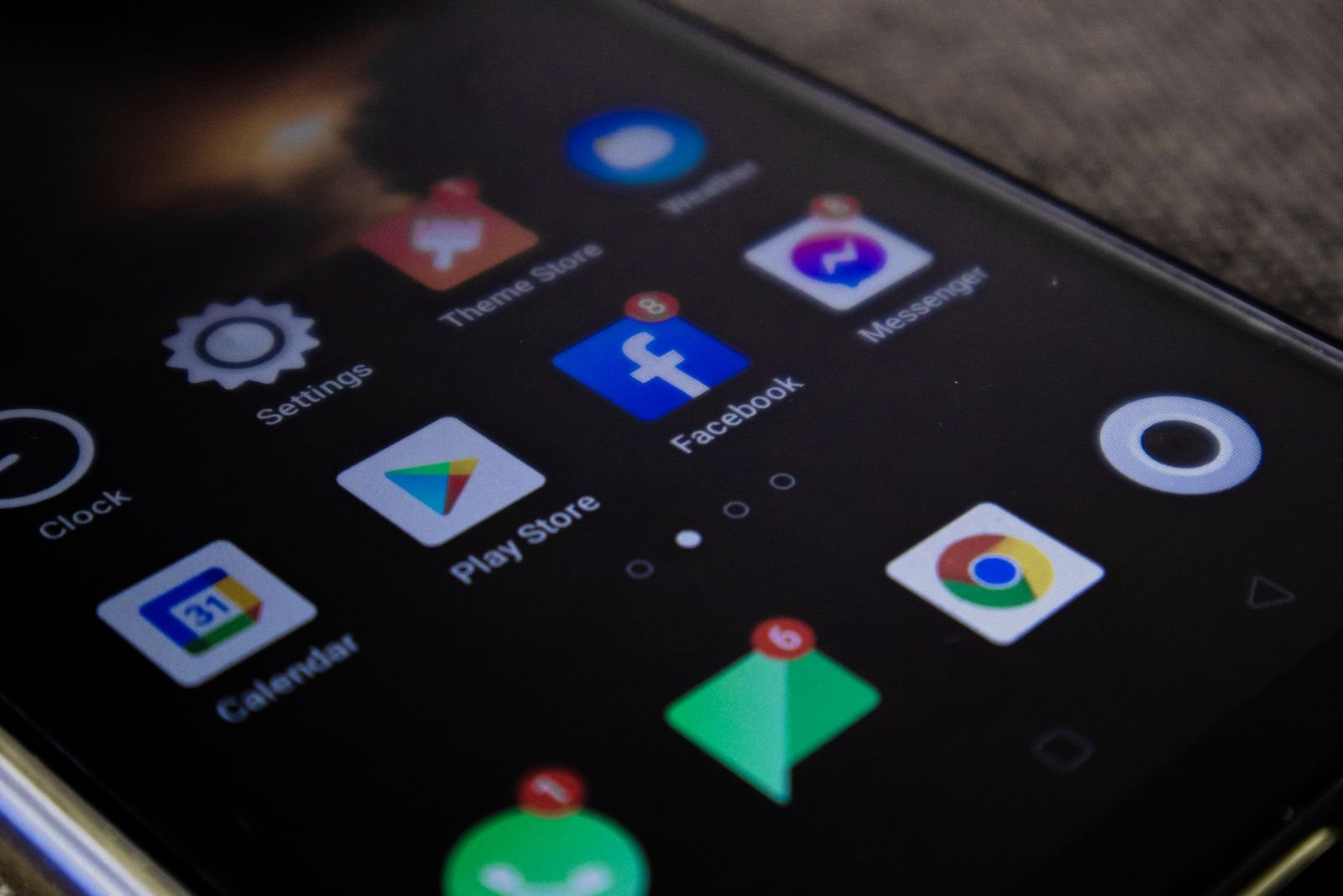 iPhone home screen full of app icons, the competition in App Store search