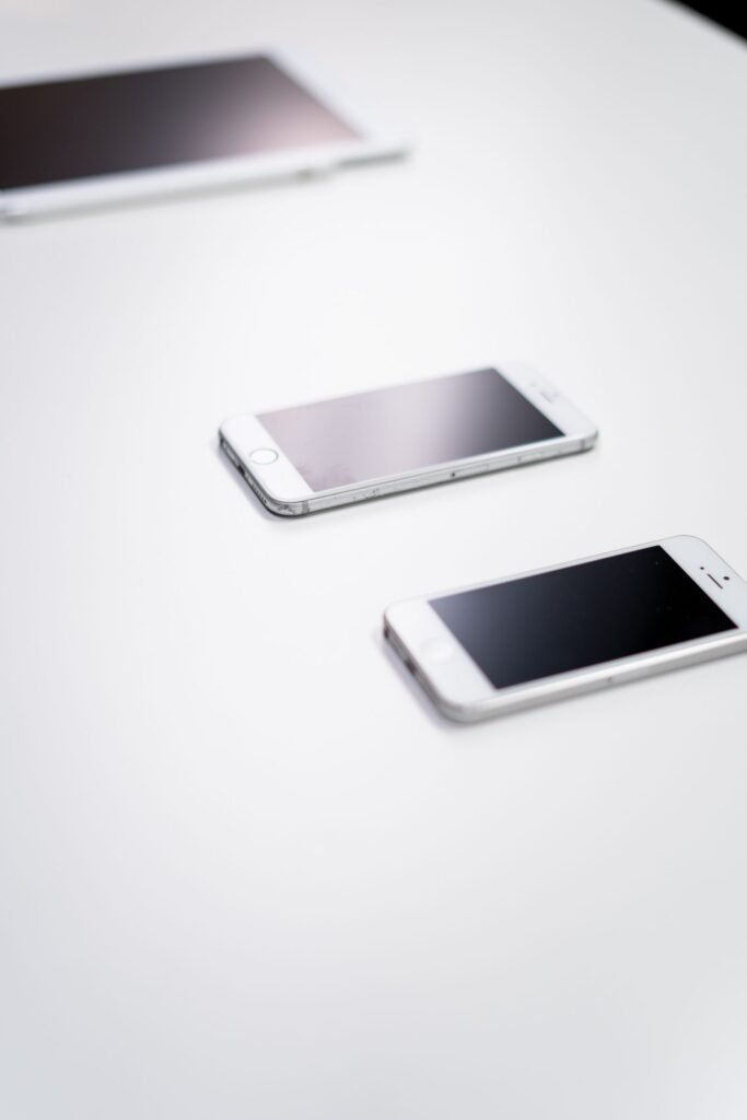 iPhone running iOS 26 held in hand, ready to start a screen recording