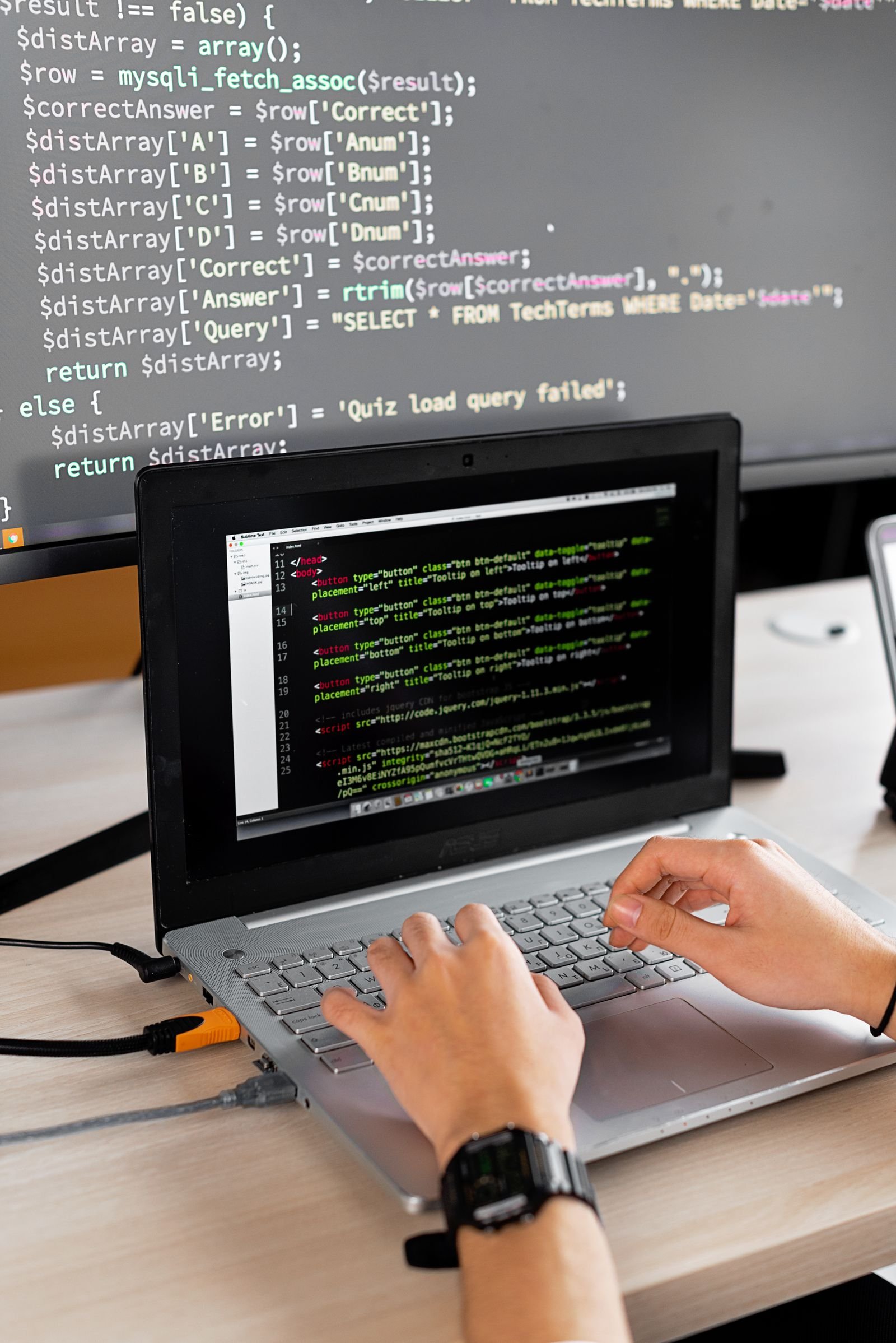 Developer coding at a desk while preparing a TestFlight beta build