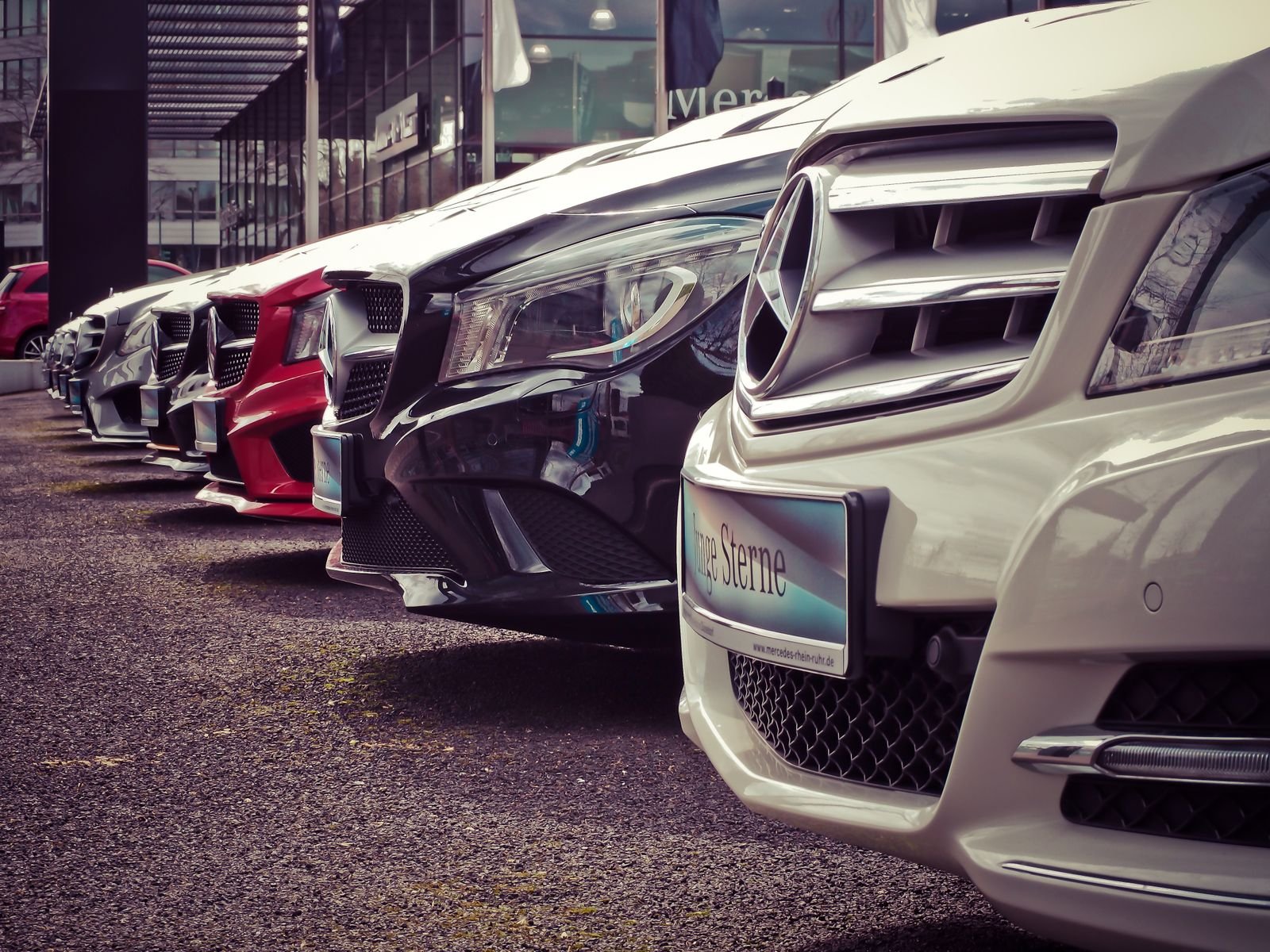 Row of cars ready to be listed on a car rental marketplace app